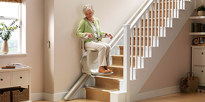 Stair Lifts near syracuse ny From Syracuse Elevator image of Elderly Person Riding Chair stair lift