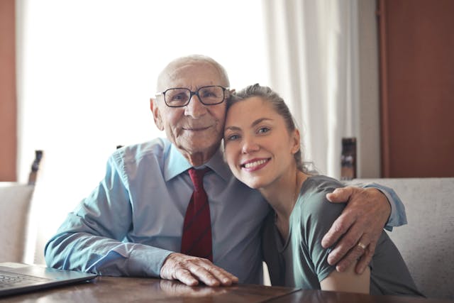 installing a home elevator can let you keep your home, older man with his granddaughter